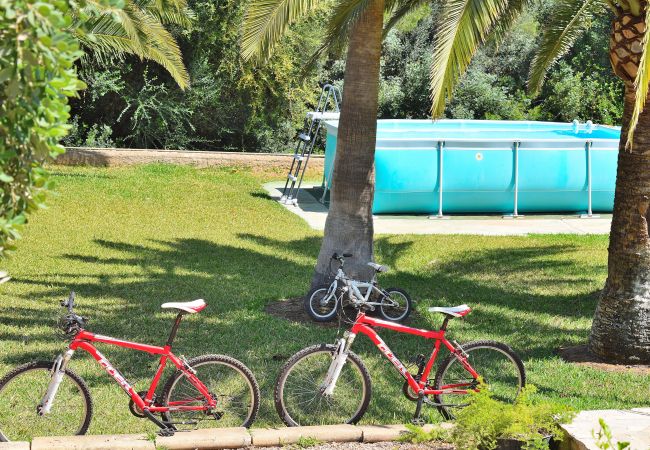  em Cala Murada - Casa Jardin 192 acogedora casa con piscina, gran zona exterior, barbacoa y bicicletas